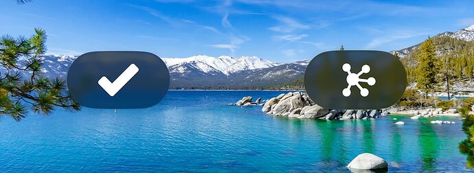 Liquid Glass buttons featuring glyphs representing OmniFocus and OmniGraffle, floating over a background image of Lake Tahoe—alluding to Omni's roadmap and macOS 26 Tahoe. (The buttons are rendered in Dark Mode on beta 2.)